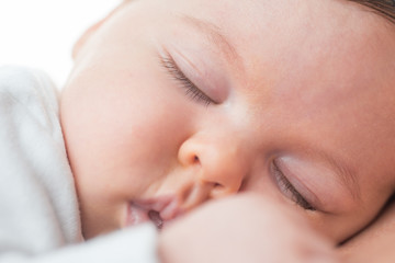 Close-up portrait of a beautiful sleeping baby