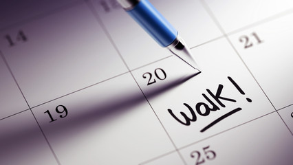 Closeup of a personal agenda setting an important date written w