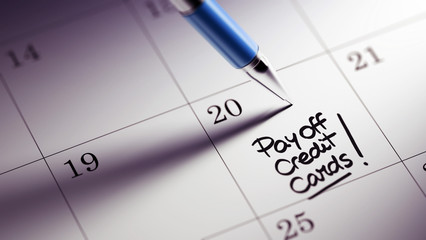 Closeup of a personal agenda setting an important date written w