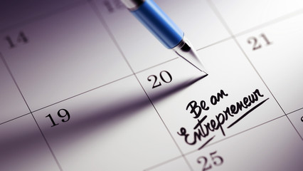 Closeup of a personal agenda setting an important date written w