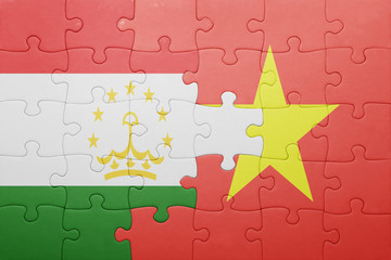 puzzle with the national flag of tajikistan and vietnam
