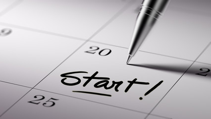 Closeup of a personal agenda setting an important date written w