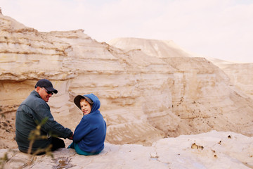 father and son hiking together