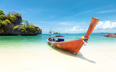 Fototapeta na wymiar Summer day on exotic beach of tropical island. Thailand tourism landscape