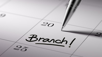 Closeup of a personal agenda setting an important date written w