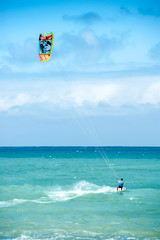 Summer extreme sports. Kite surf activity of professional athlete
