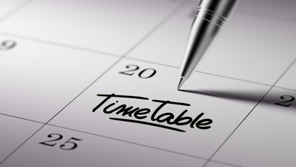 Closeup of a personal agenda setting an important date written w