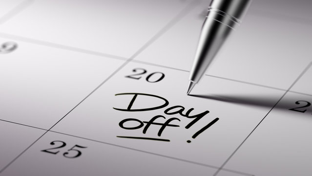 Closeup of a personal agenda setting an important date written w