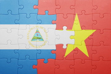 puzzle with the national flag of nicaragua and vietnam