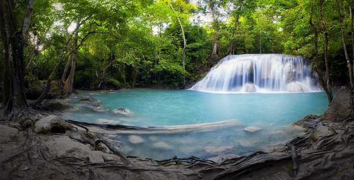 Waterfall and pond with blue water in Thailand panorama photography