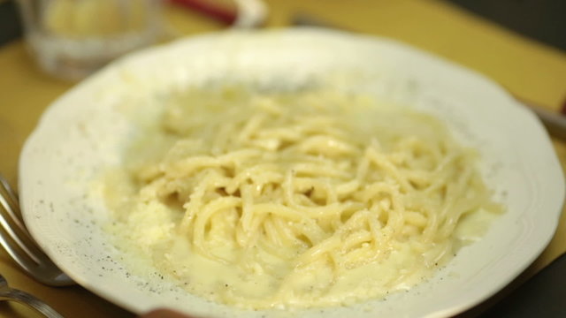 Italian pasta with cheese and pepper called cacio e pepe   