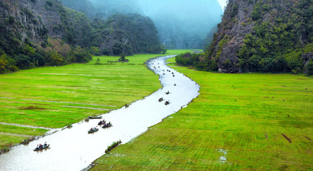 Vietnam travel landscape. Twisted river and mountains of Tam Coc Ninh Binh 