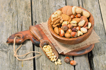 Assortment of nuts in a wooden plate