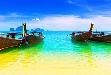 Fototapeta na wymiar Thailand nature beautiful island and traditional wooden boat. Scenery tropical paradise resort