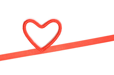 Decorative heart and ribbon on white. Top view, copy space. Valentines day concept