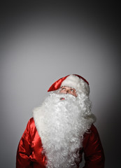 Santa Claus is looking up