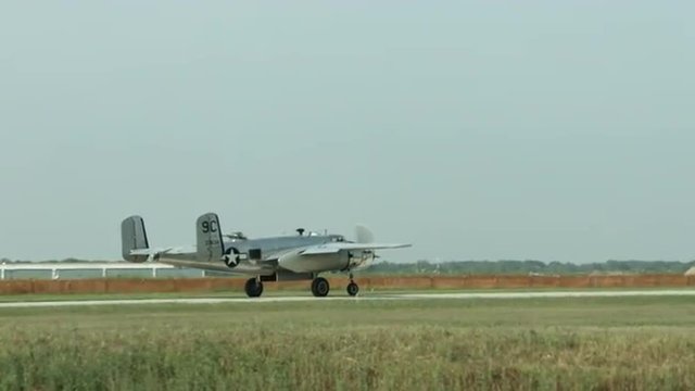 B-24 Liberator from World War II taxiing at airfield.  Recorded in 4K, ultra high definition.