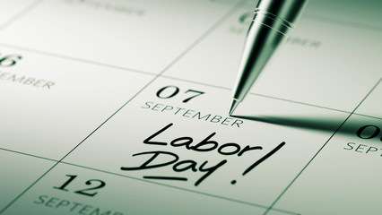 Closeup of a personal agenda setting an important date written w