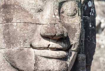 Close up face sculpture of Angkor Wat in Cambodia