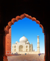 Taj Mahal Indian palace through doorway arch. Agra, India - 99872970