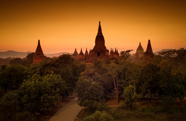 Ancient Buddhist temples in Bagan Myanmar at sunset