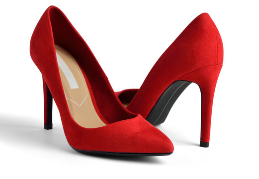 Red suede high-heeled on white