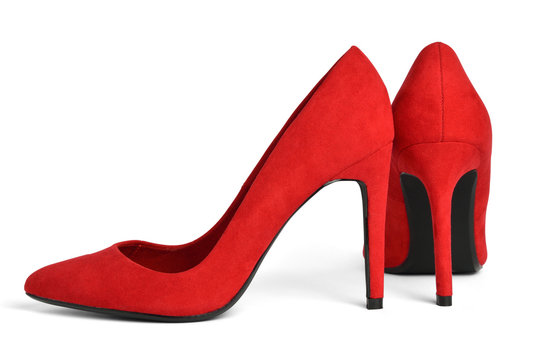 Elegant red suede high-heeled shoeson white