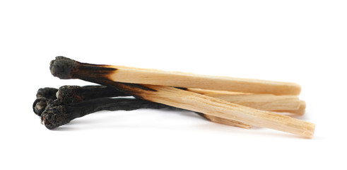 Pile of burnt match sticks isolated