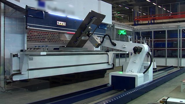 Тhe Robotized Machine Processes the Sheet of Iron