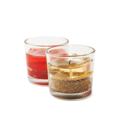 Red and golden gel candles isolated