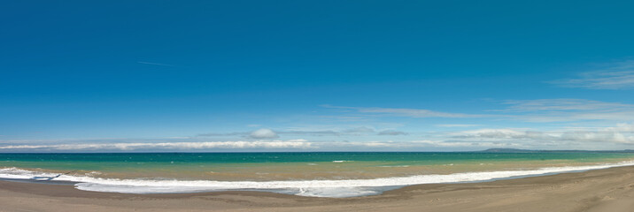 Long and empty ocean coast beach panoramic view background