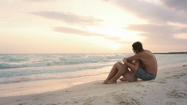 Couple hugs and enjoys sunrise or sunset  gimbal steadicam  