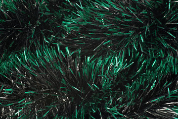 Fototapeta premium Surface covered with tinsel garland