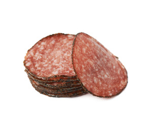 Pile of salami slices isolated