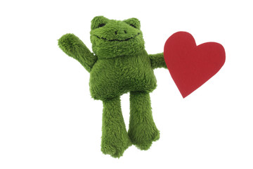Green frog toy with heart studio shot