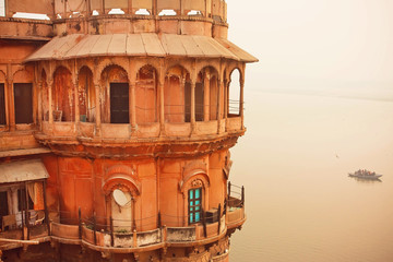 Tower view on sacred waters of River Ganges in historical indian city