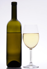white wine bottle and glass