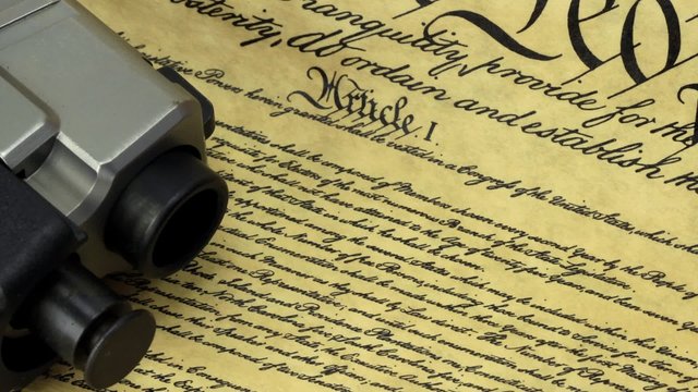US Constitution with Hand Gun - Right To Keep and Bear Arms