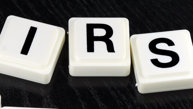 The Word IRS Taxes  - A Term Used For Business in Finance and Stock Market Trading