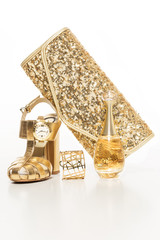 Sexy and fashionable set of glamour golden accessories for woman