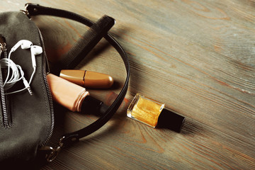 Ladies handbag on wooden background