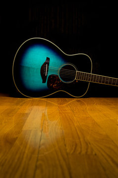 Guitar on hardwood