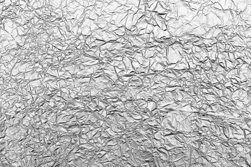 Silver crumpled foil background