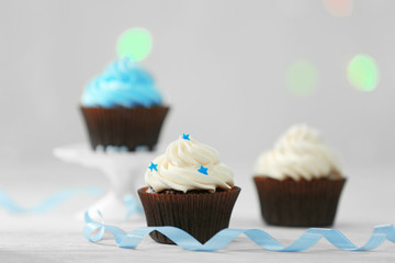 Chocolate cupcakes on blurred background