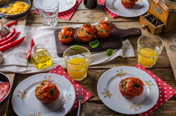 Baked tomatoes stuffed with herbs