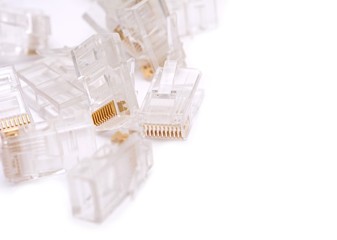 Closeup of the ethernet RJ45  installing connectors on a white background.
