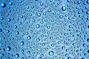 Water drops on glass surface texture.