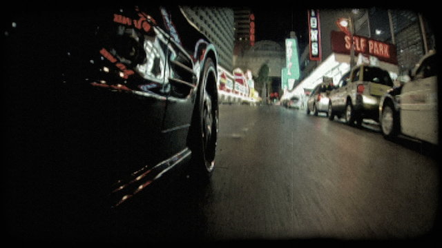 Black car in Vegas 2. Vintage stylized video clip.