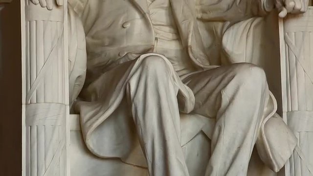 Iconic Abraham Lincoln statue inside the Lincoln Memorial in Washington DC.