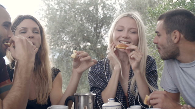 Friends enjoy italian breakfast in tuscany, italy  slow motion  